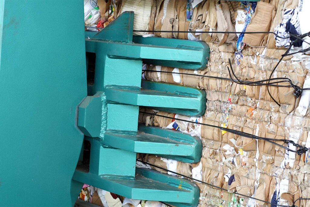 Macpresse baler with plastic wire tying system for RDF bales